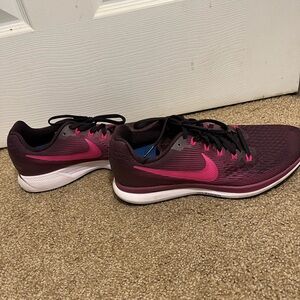 Black and pink Nike sneakers